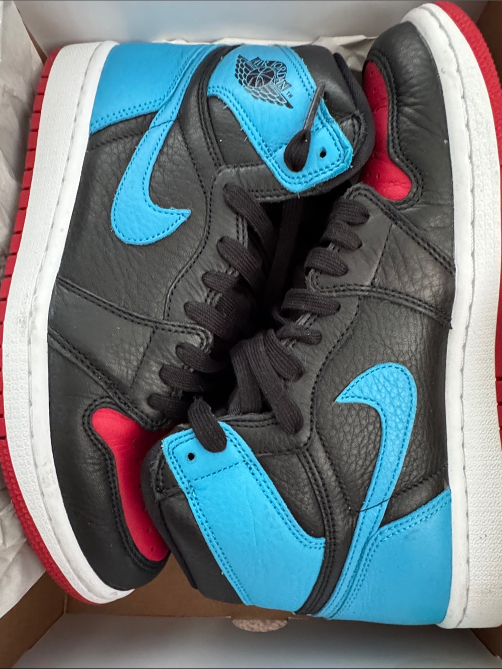 Jordan womens size 9 High-Top Sneakers in Black/Blue/Red